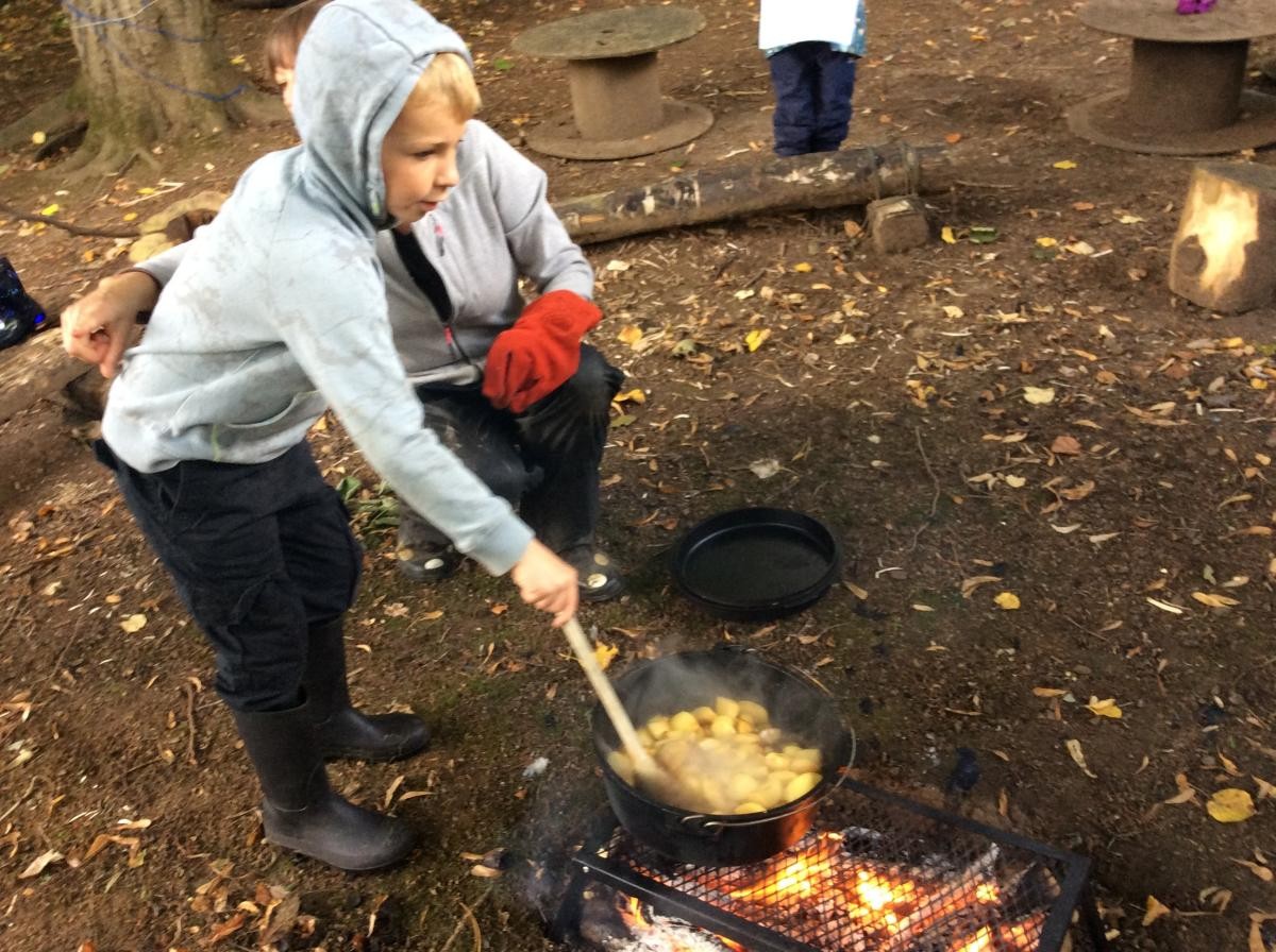 We put all the ingredients into the dutch oven and took turns stirring it.