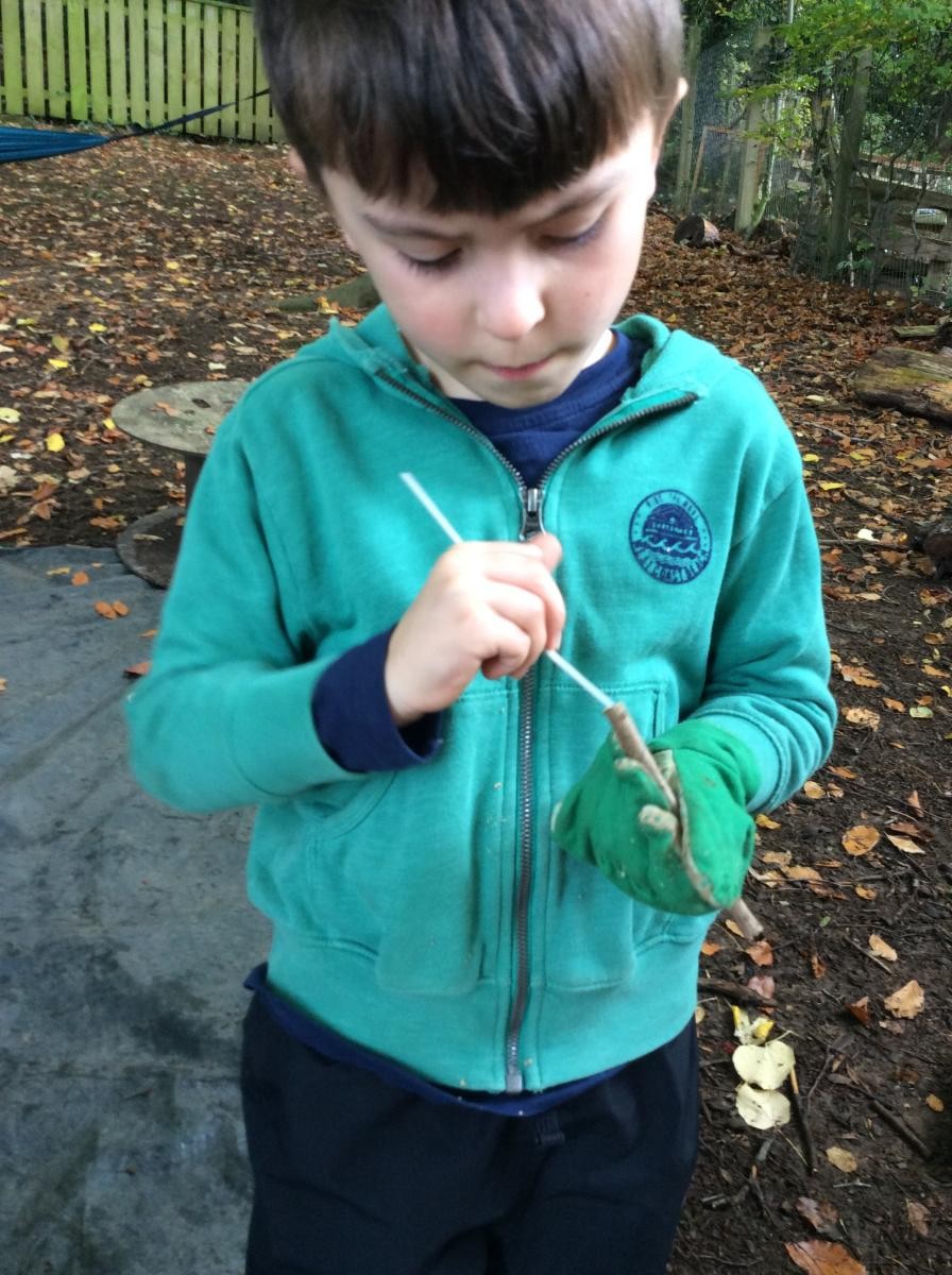Some of us used elder sticks to make some beads again.