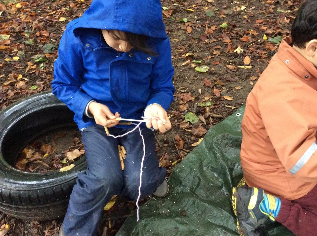 We threaded the beads onto yarn to make jewellery.