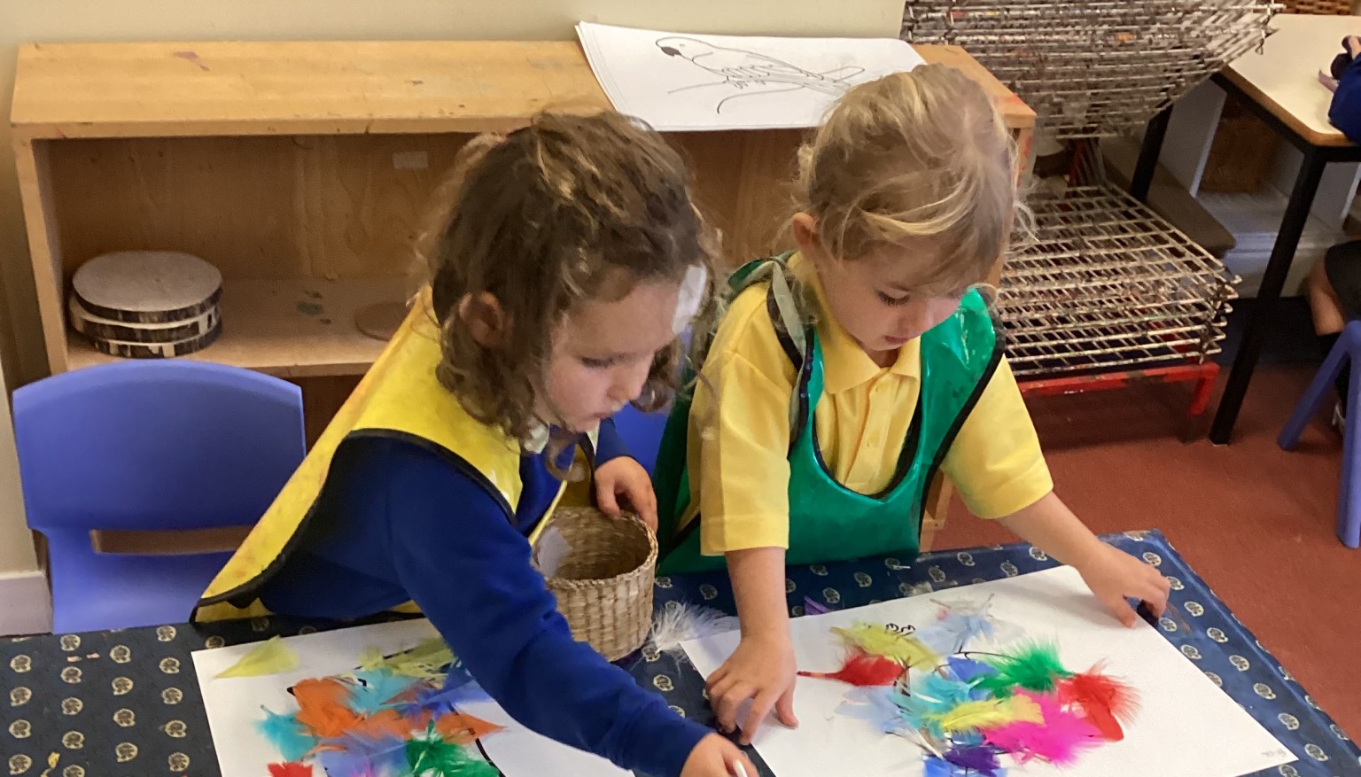 Sticking feathers...