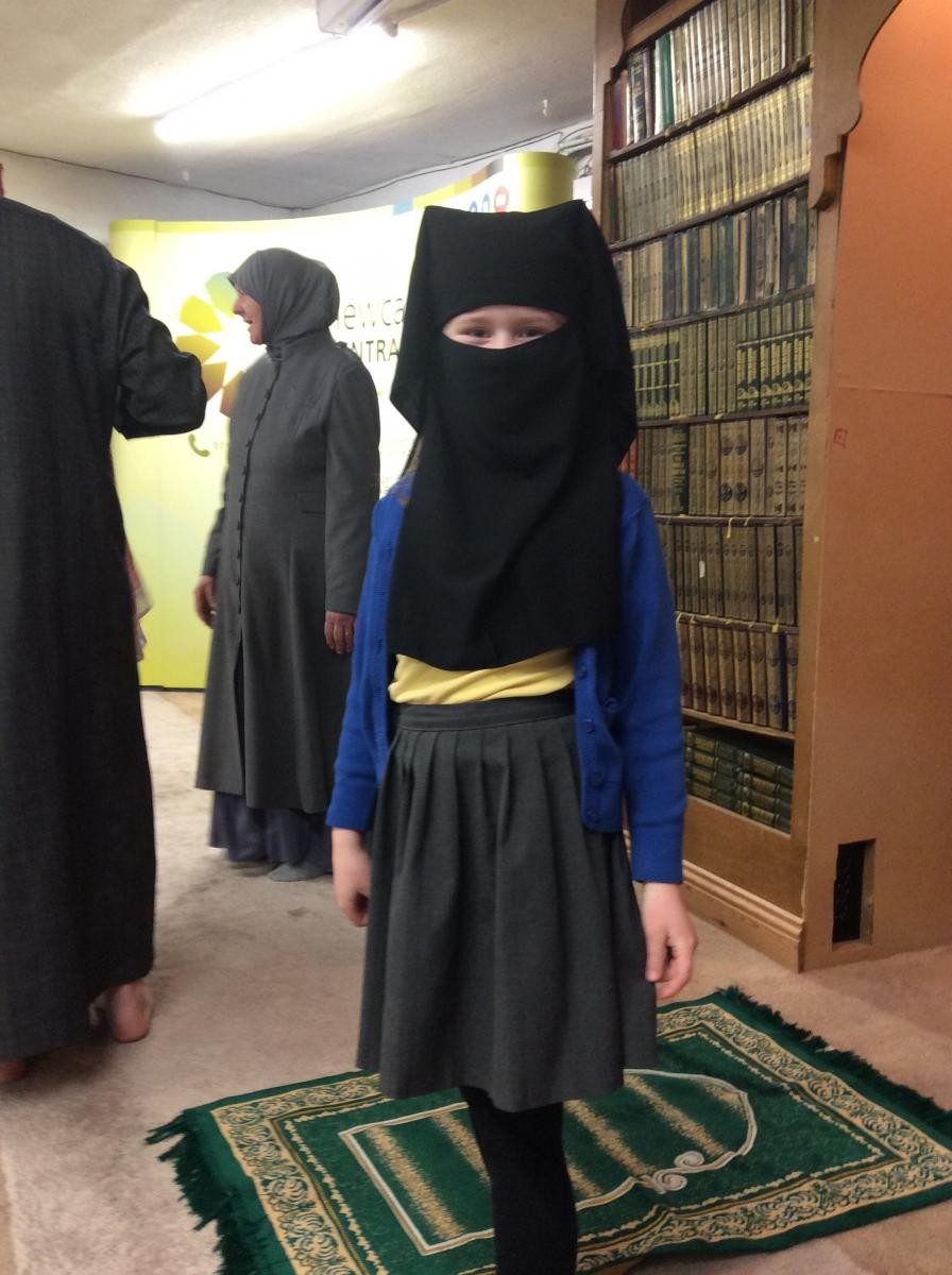 We had fun trying on clothing some Muslims wear 