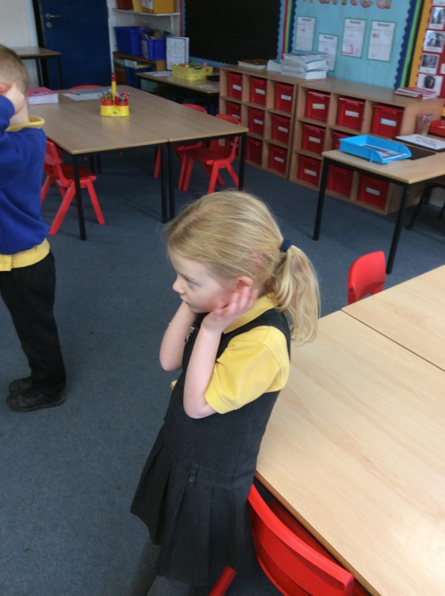 Washing behind our ears.