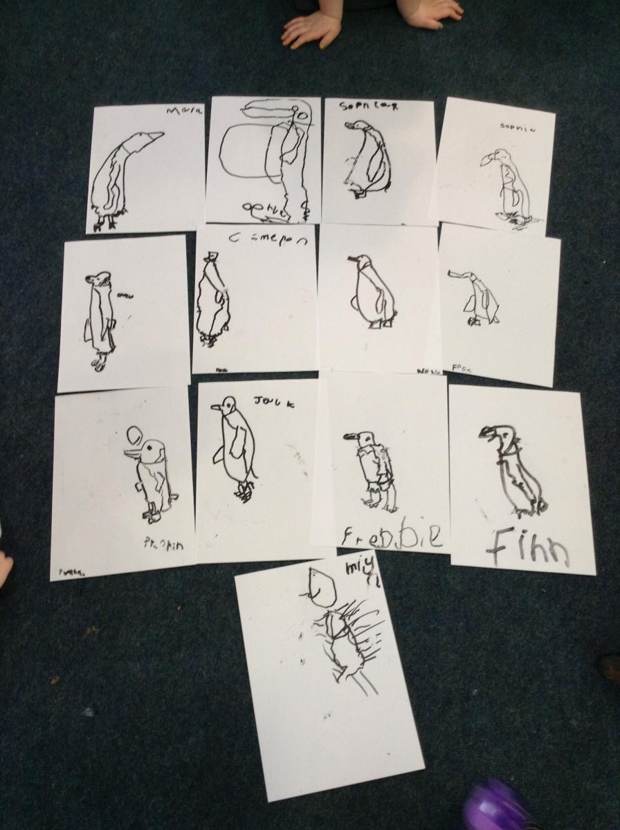 Reception Class use their drawing skills to create penguins