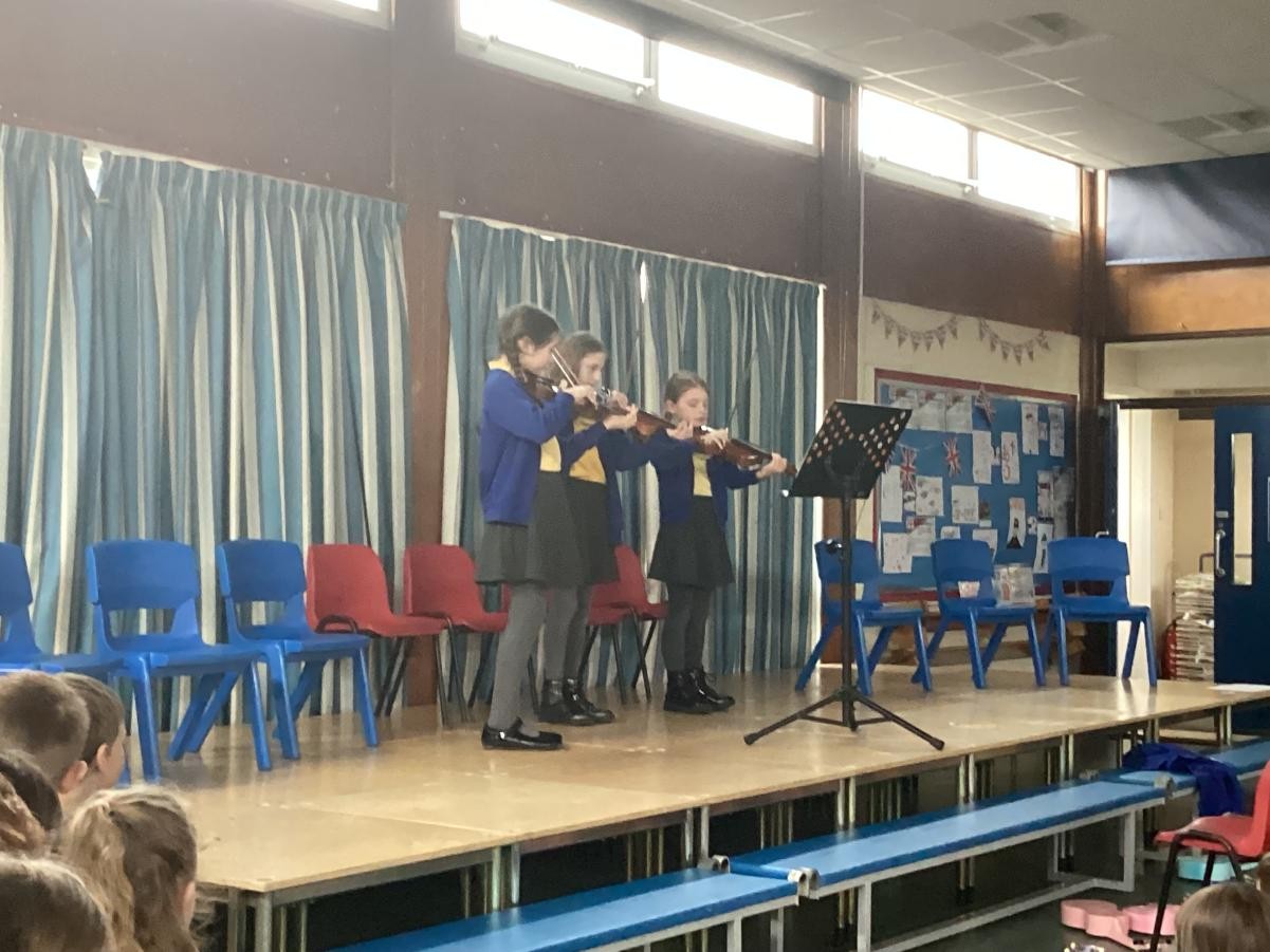 Violinists performing at the Spring Music Concert