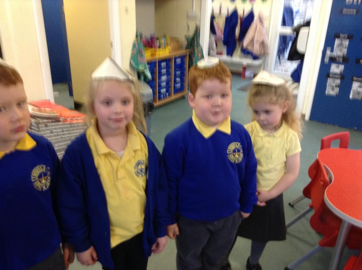 Reception class  make road safety hats.