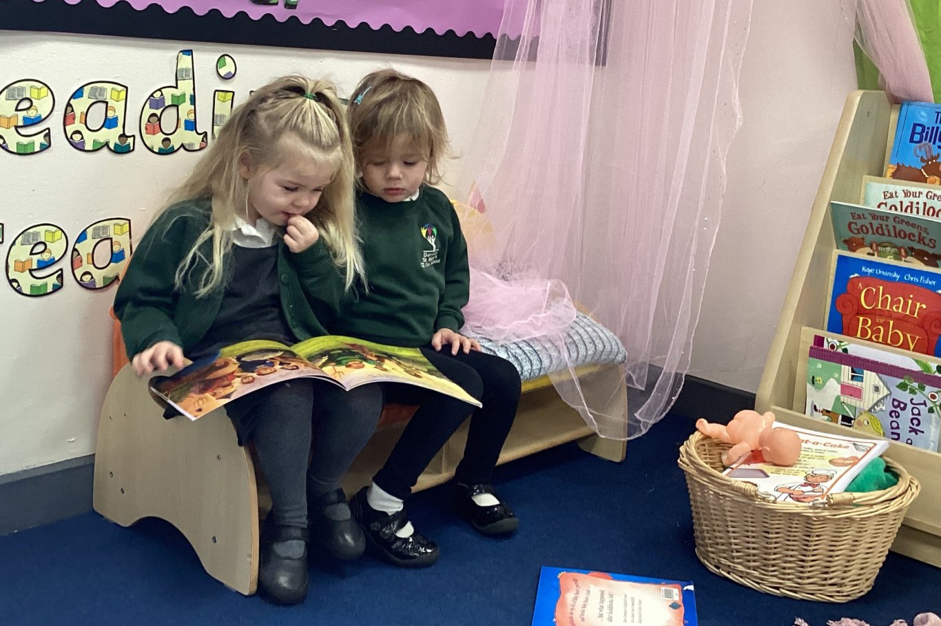 Girls reading a book