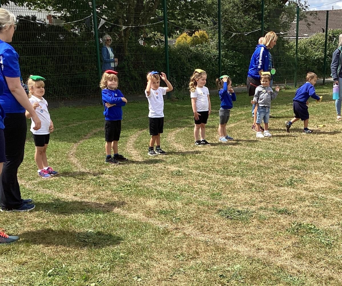 Nursery children ready to do the beanbag race at Sports Day. 