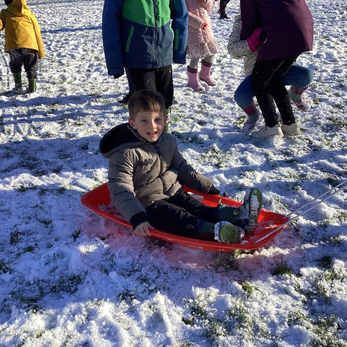 We like to make the most of the special weather - Nursery and Reception Children enjoying the snow in the school grounds. 