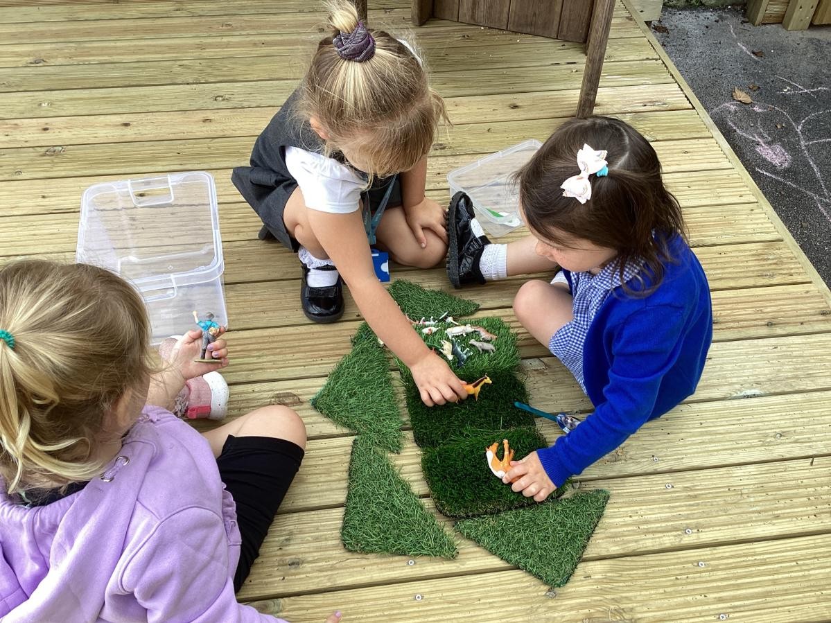 Nursery and reception children play together regularly. 