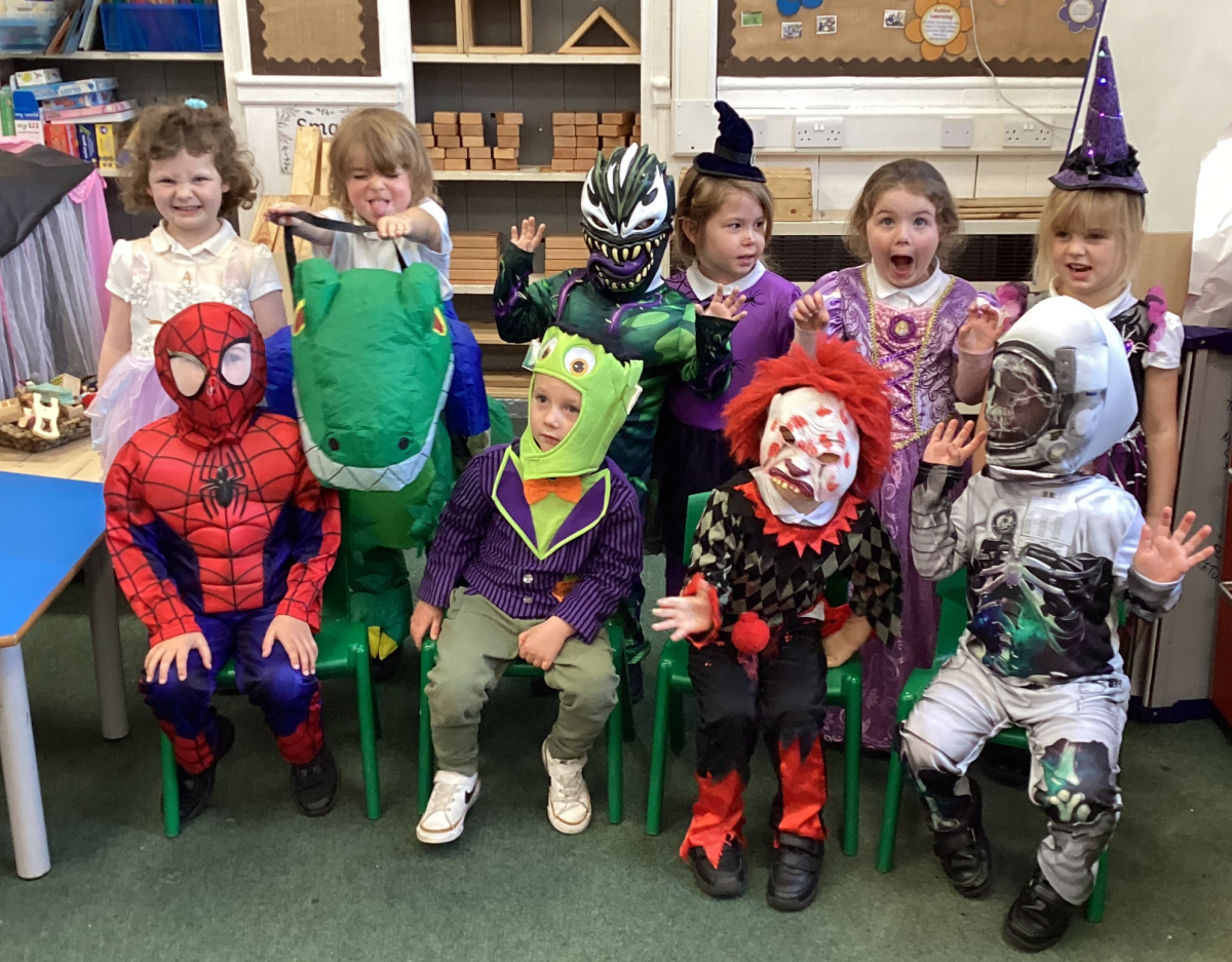 Nursery and Reception children ready to enjoy the Halloween school disco