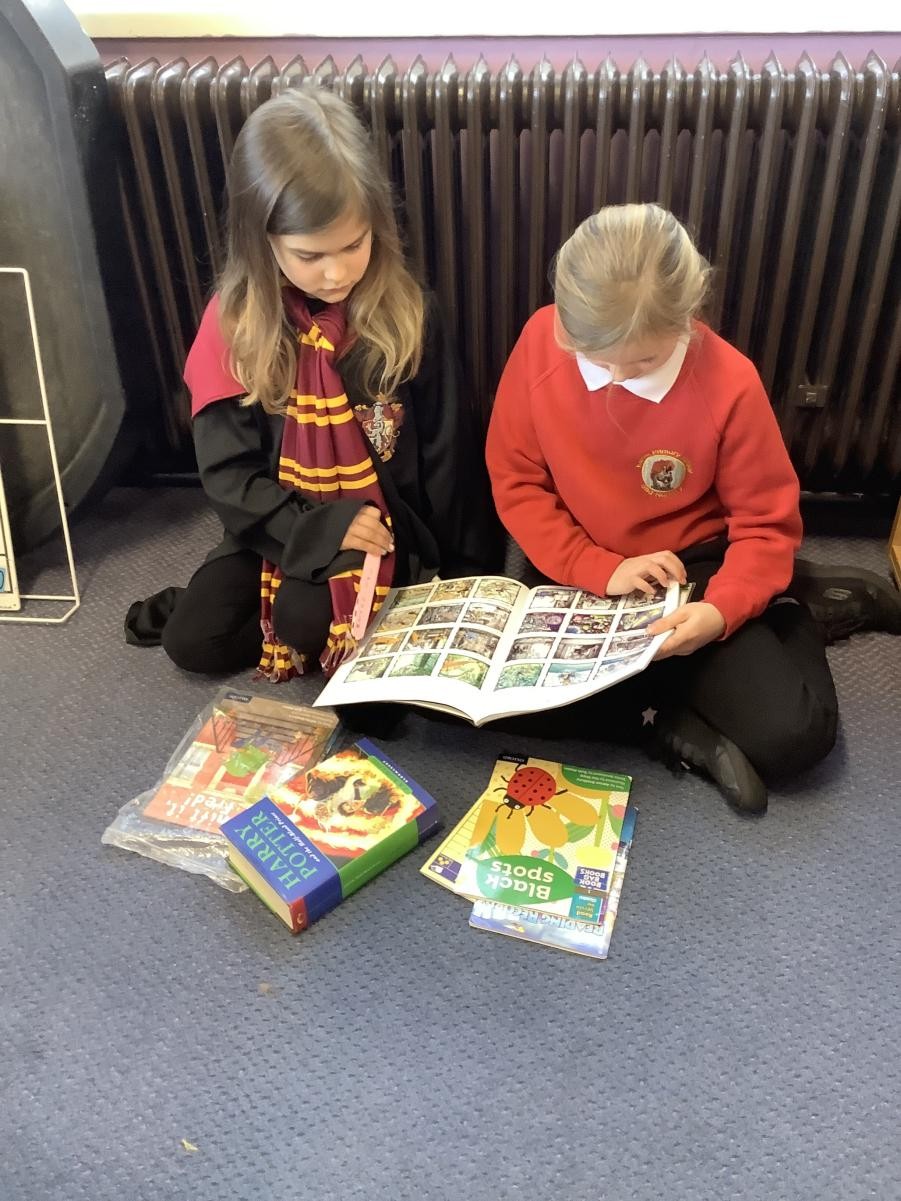 Dakota (Year 1) and Esme (Year 3) reading together