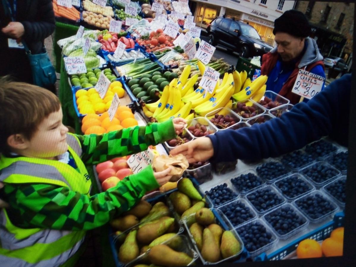 Reception trip to Hexham Market before they learn about other markets around the world with the book 'My Granny went to Market'