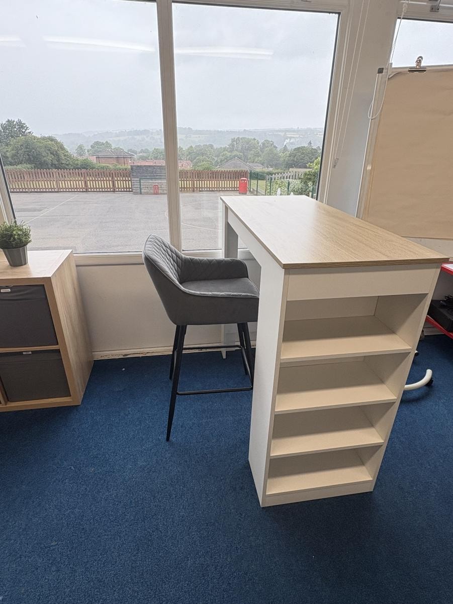 High desks - Therapeutic classrooms include calm spaces and flexible seating and allow children to work where they feel most comfortable. 