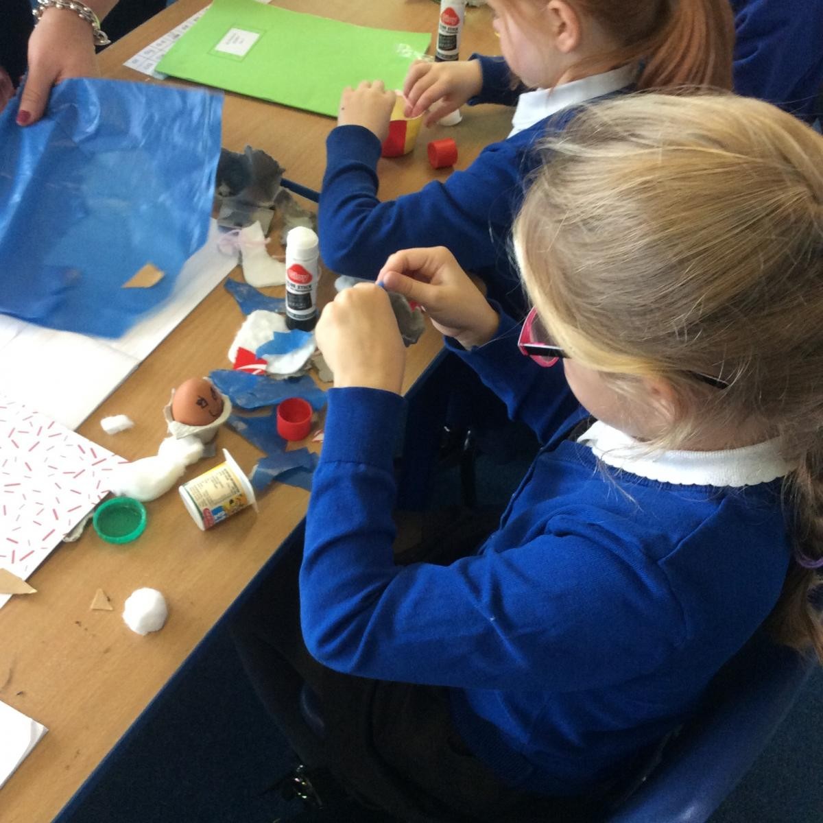 Creating crash helmets to protect eggs.