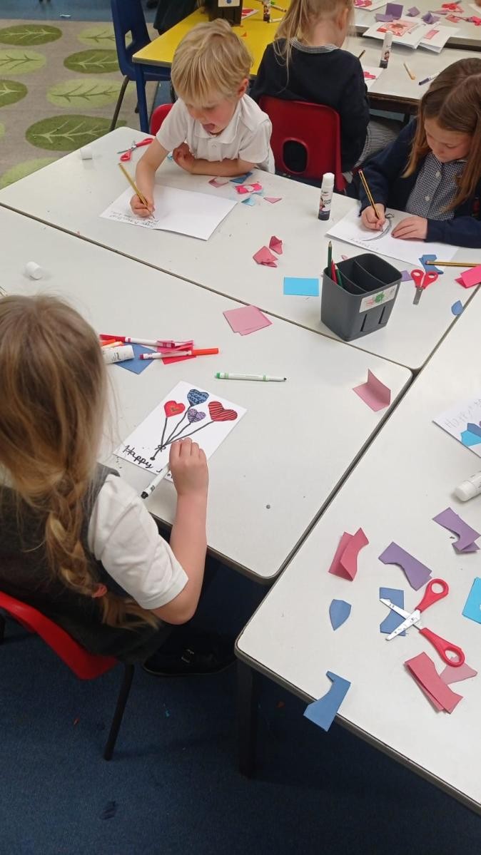 Pupils making celebration cards