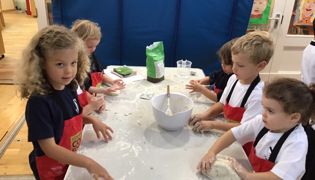 After mixing and kneading the ingredients, we left the dough to prove, observing how the yeast helped the dough grow.