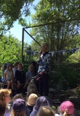 Reverend Gina blessing the garden and encouraging us all to take a moment to pause and be still.