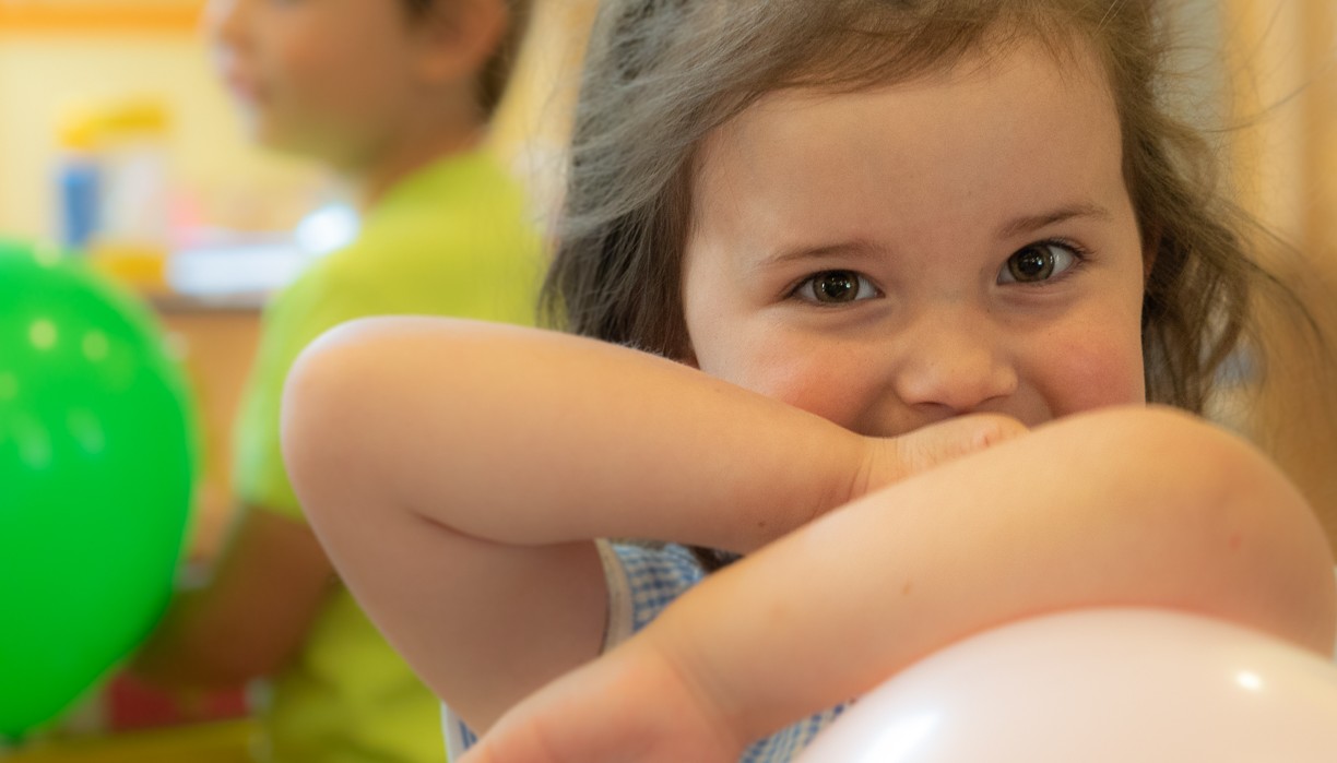 Child holding a balloon 