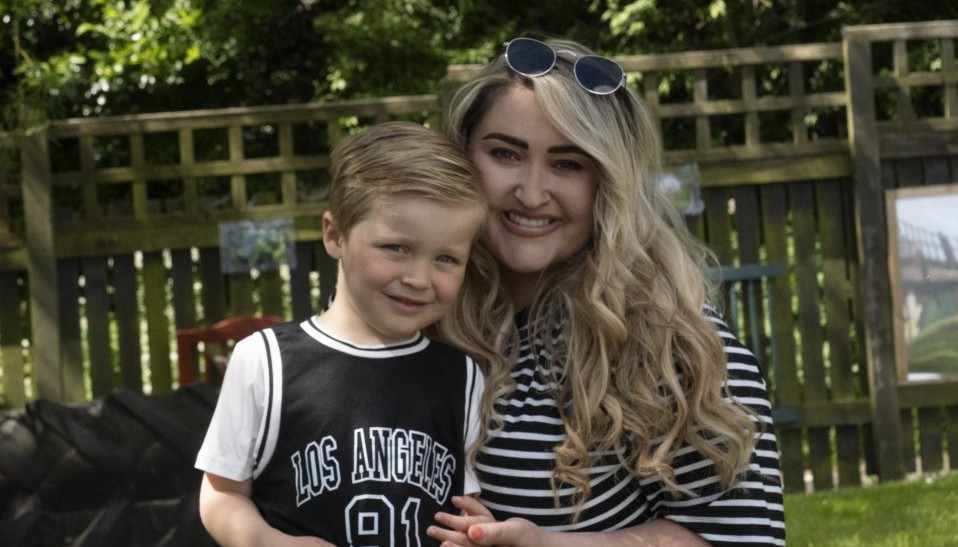 Adult and child smiling 