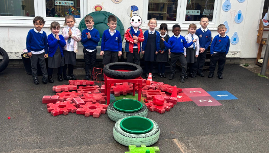 Creating a poppy used mixed media in our outside area.