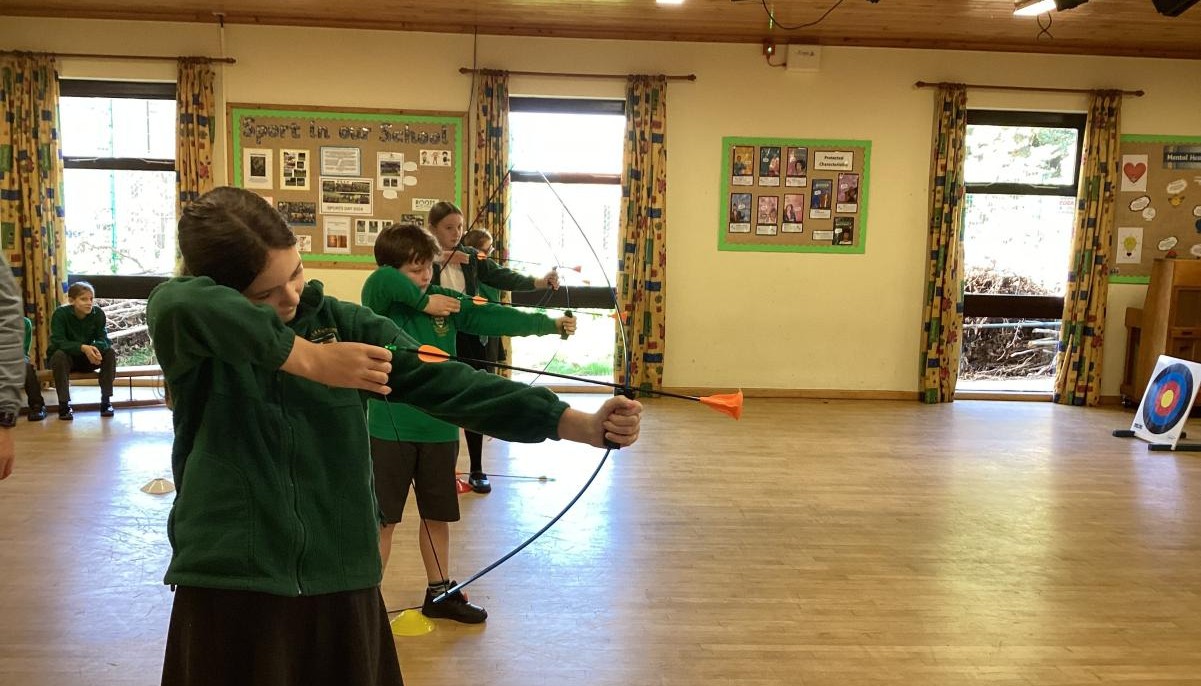 Pupils take part in archery