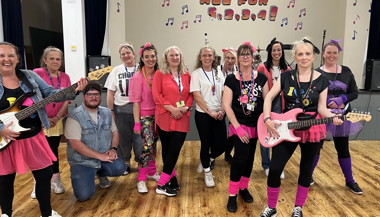 The staff joined the pupils dressing up to take part in the Whole School Production All for 1,2,3,4!