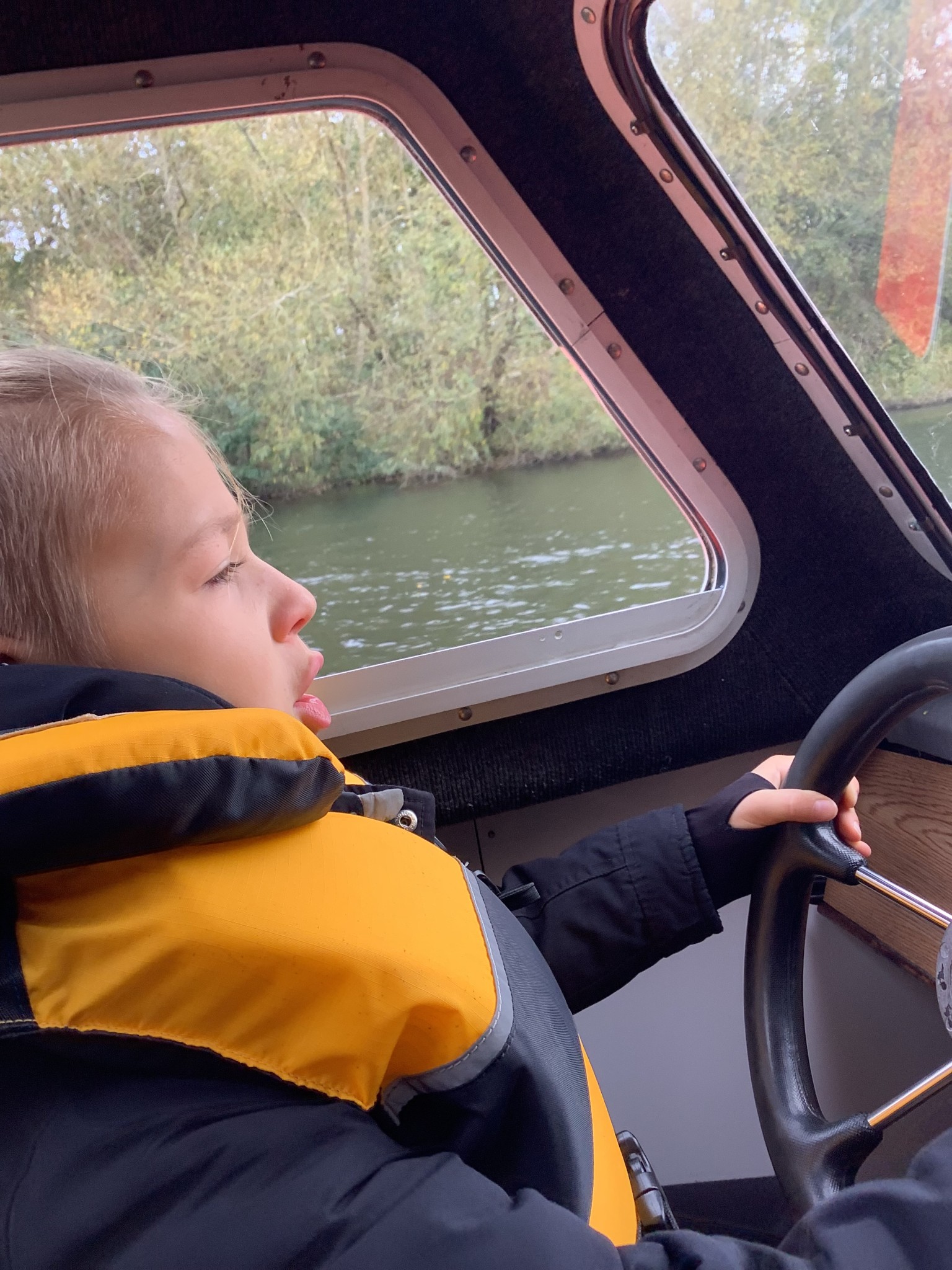 We drove a boat down the Norfolk Broads.