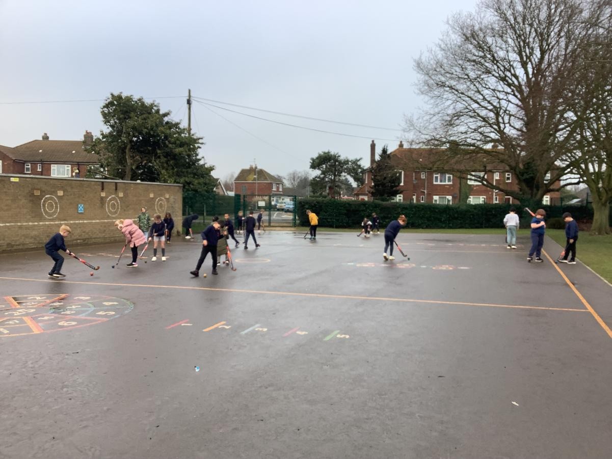 This week, we enjoyed learning how to dribble a ball in our hockey lesson!