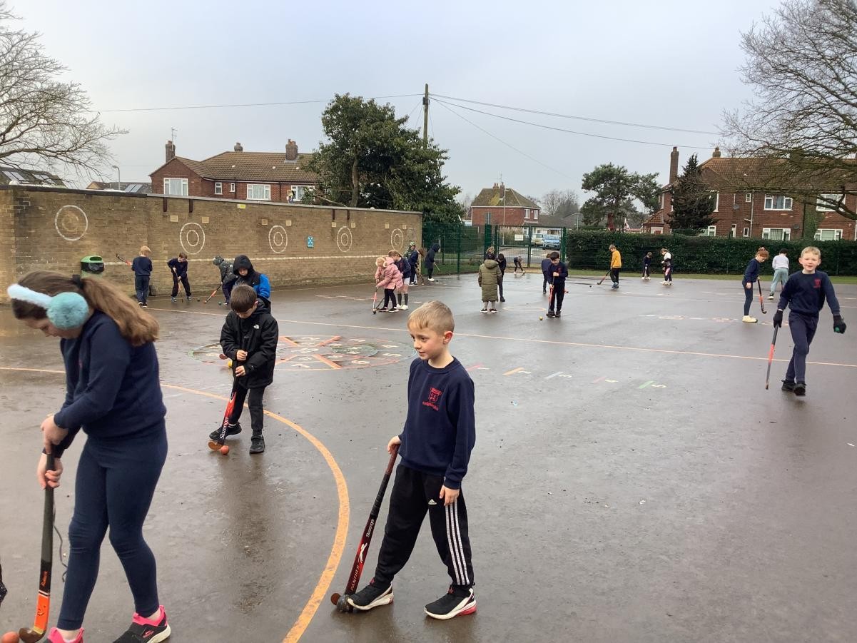 This week, we enjoyed learning how to dribble a ball in our hockey lesson!