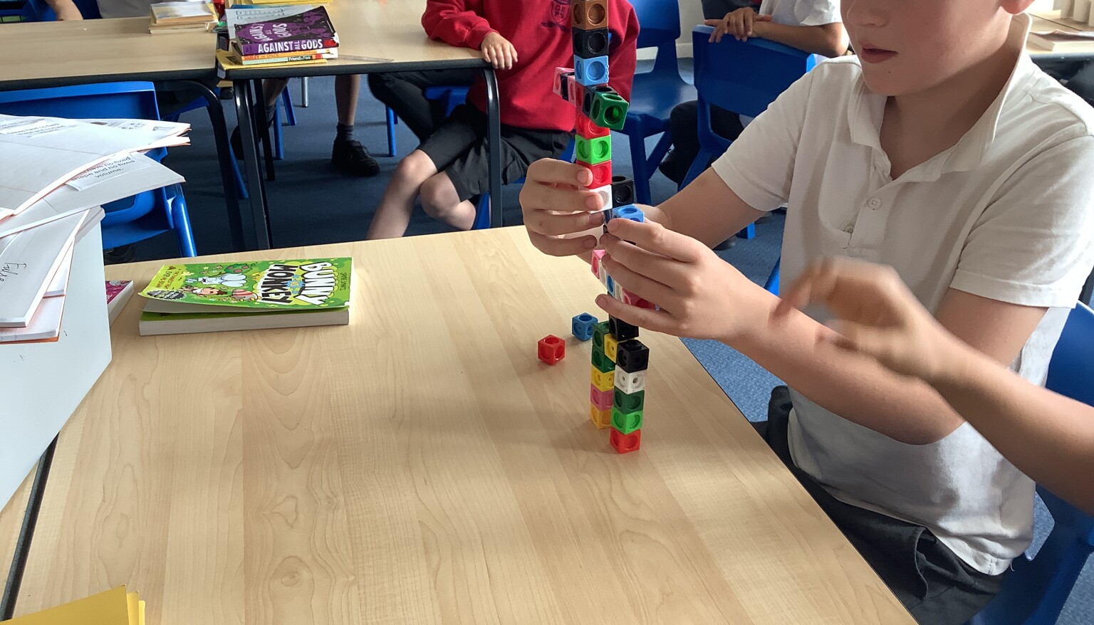 In art, we built sculptures out of cubes to understand the features and purpose of sculptures.