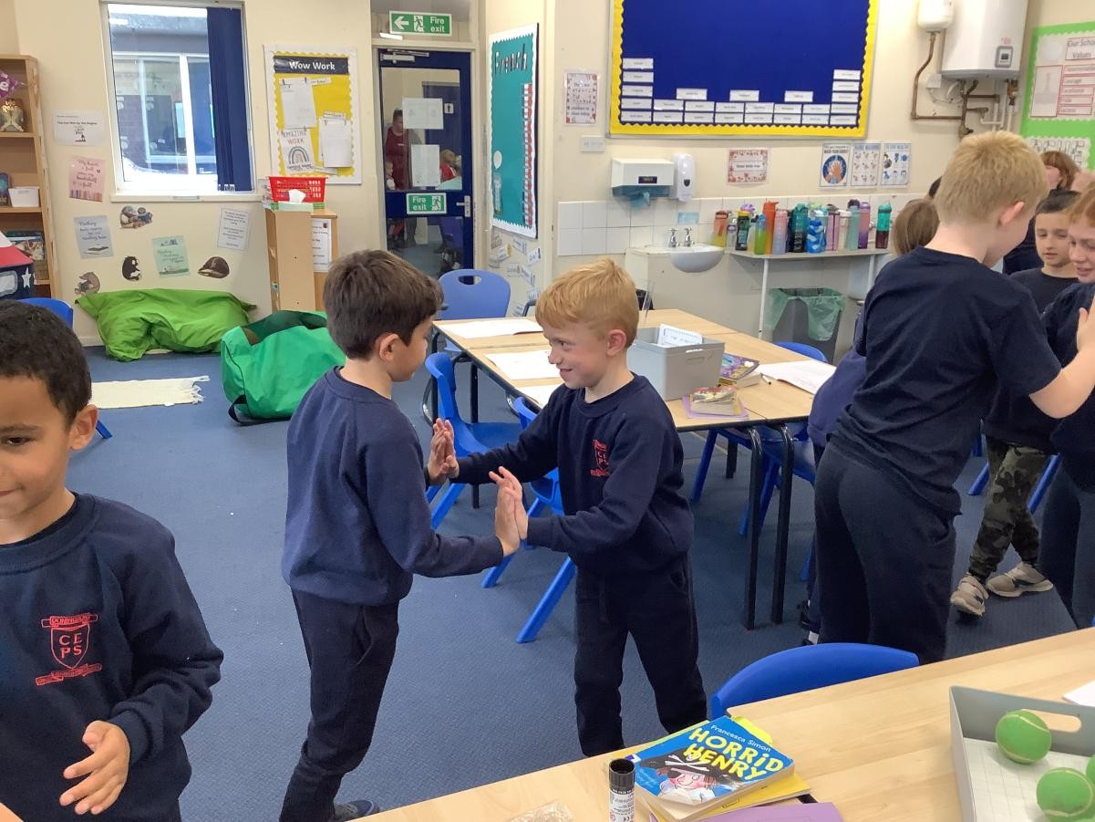 To test balanced and unbalanced forces, we worked in groups to push and pull different objects. We even tested our strength against others.