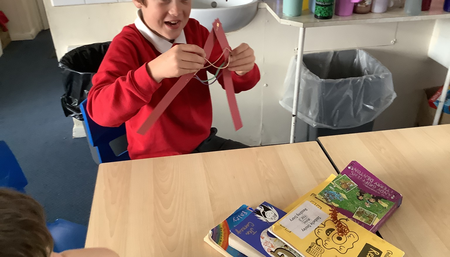 In science, we used pins, paper and elastic bands to demonstrate the use of muscles.