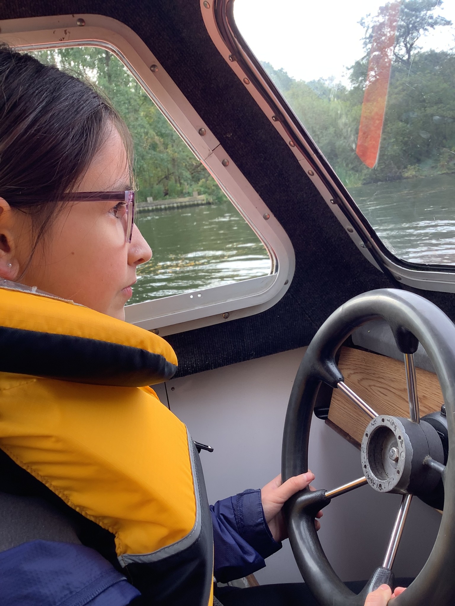 We drove a boat down the Norfolk Broads.
