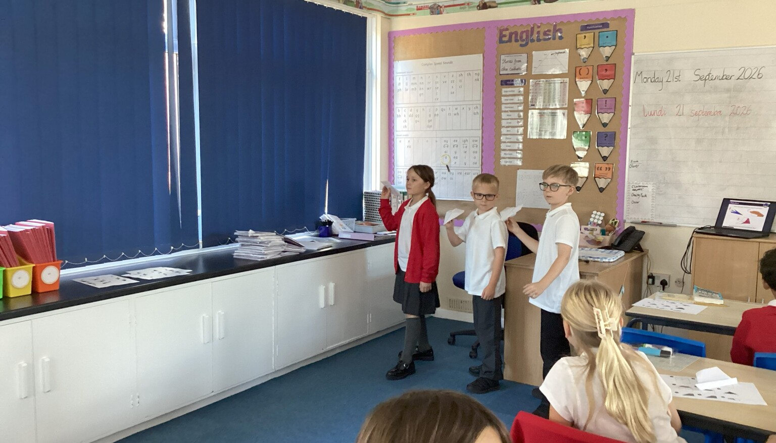Testing our paper aeroplanes in science to see the effects of air resistance!