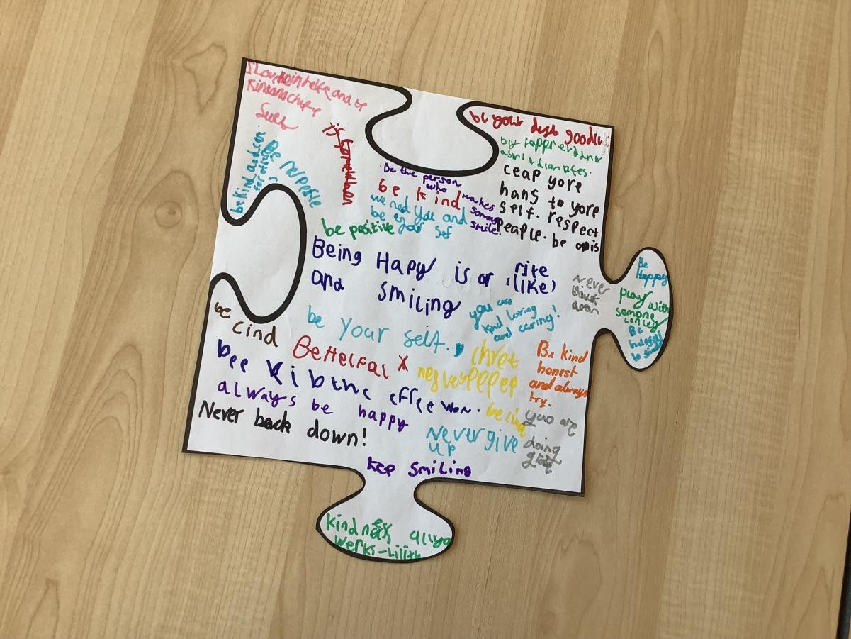 In support of World Mental Health Day, we wrote messages on a puzzle piece. These messages showed kindness and made others smile!