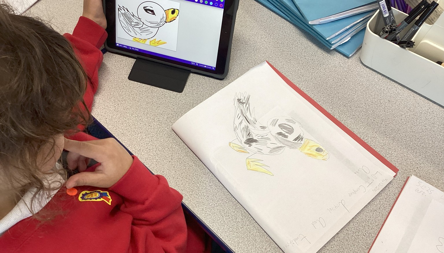 Comparing digital and traditional art.