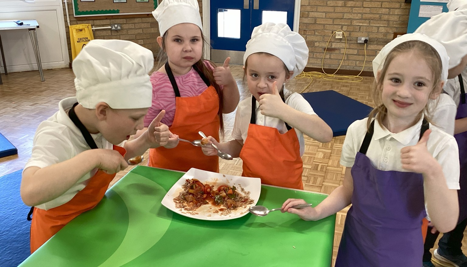 Enjoying sweet and sour chicken at Roots to Food!