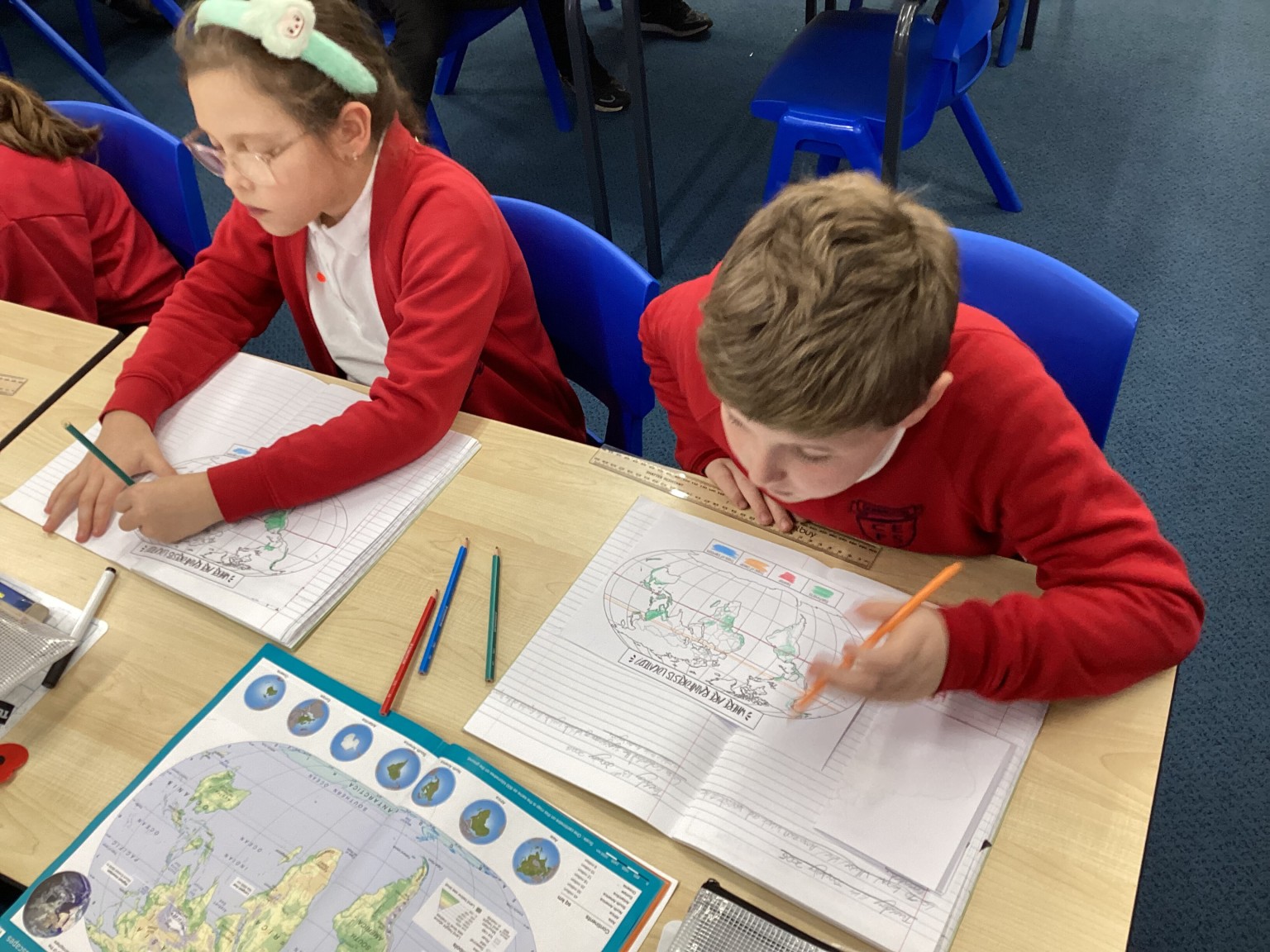 Geography - We used atlases to find out where rainforests are located.