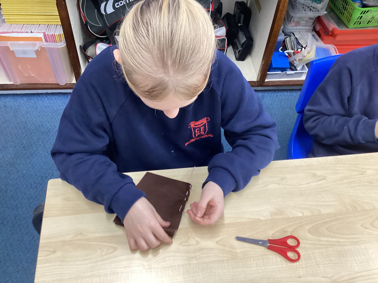 DT - We practised sewing techniques.