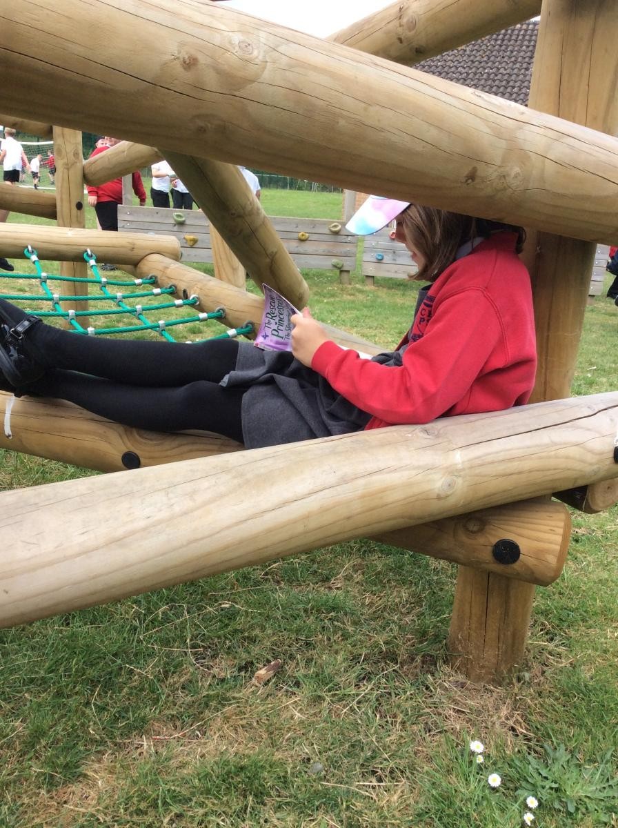 We like to bring books outside on the trim trail