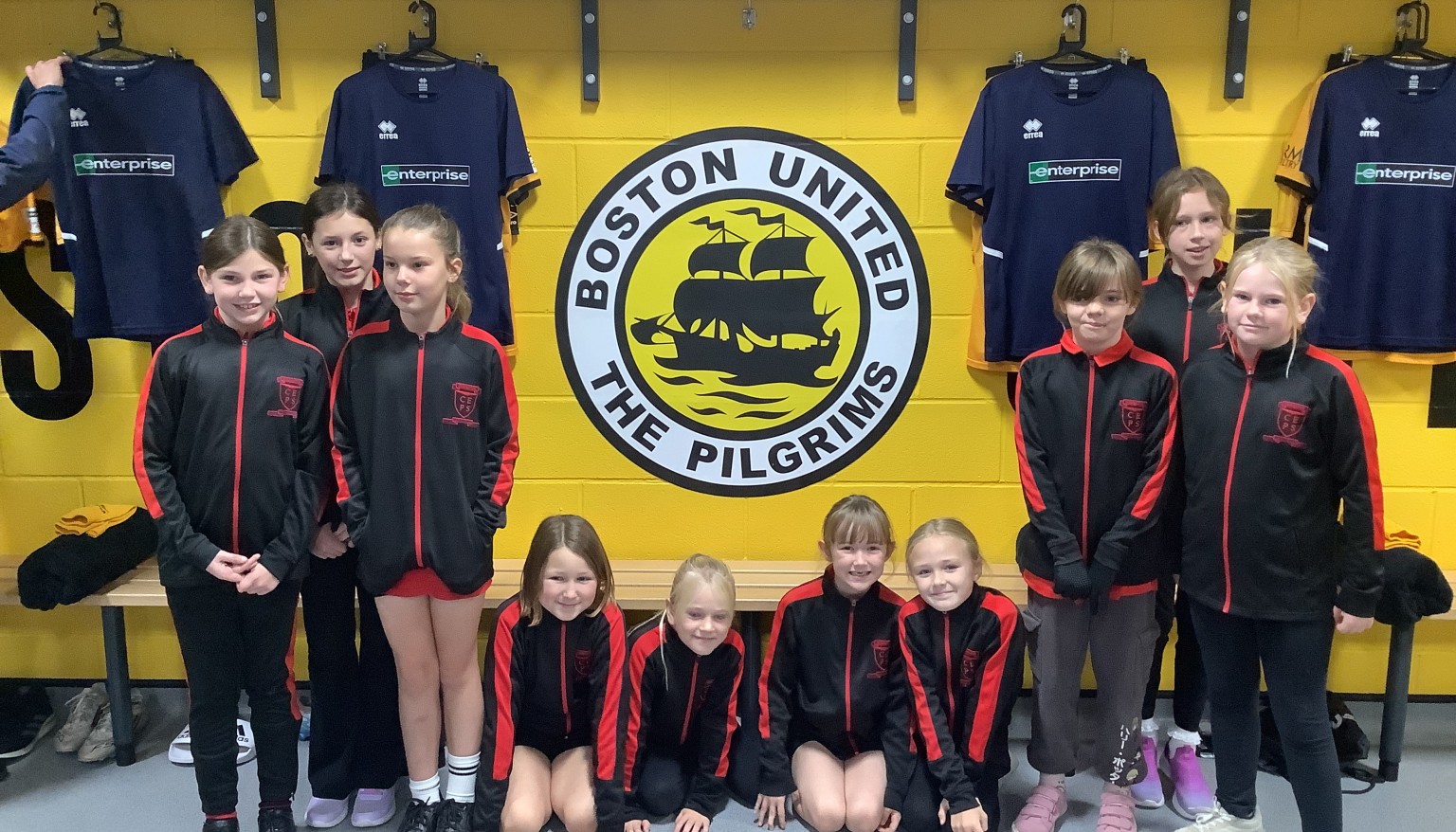 We got to see the home and away changing rooms on a match day. All the kits were out ready.