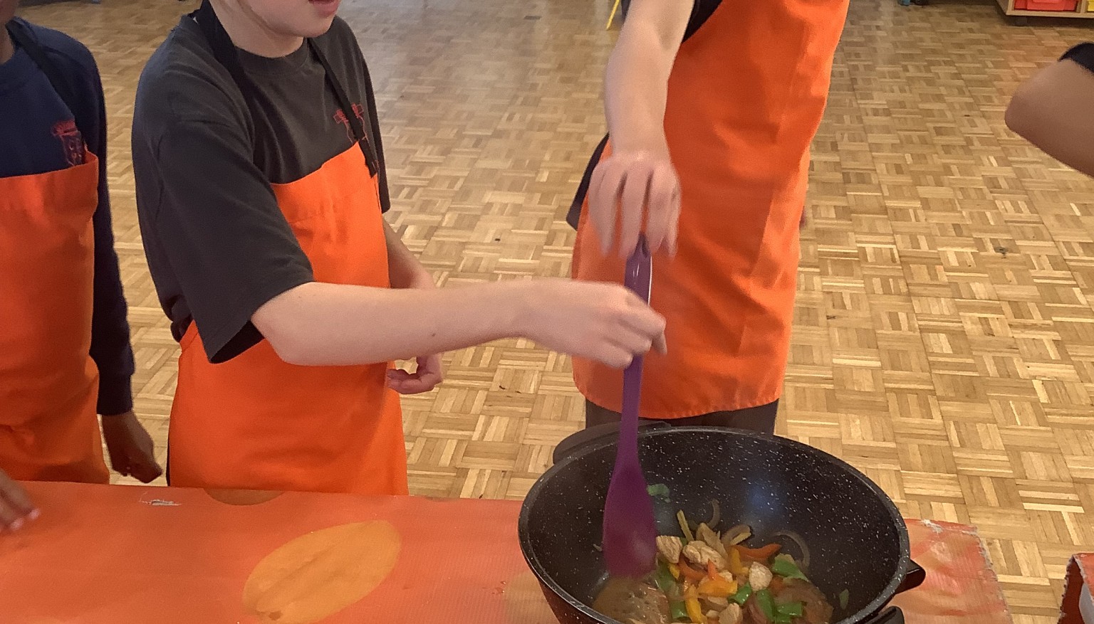 We learnt how to cook with Darren.