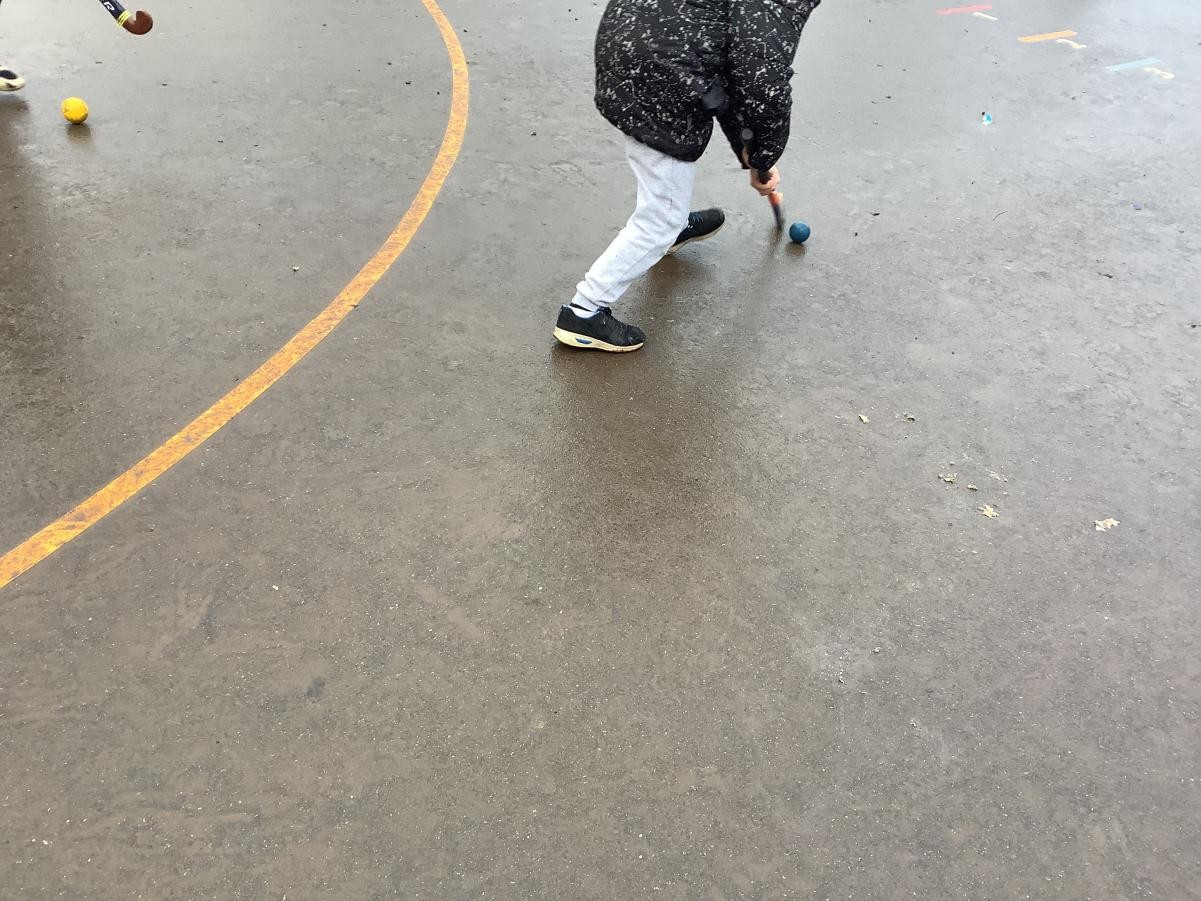 This week, we enjoyed learning how to dribble a ball in our hockey lesson!