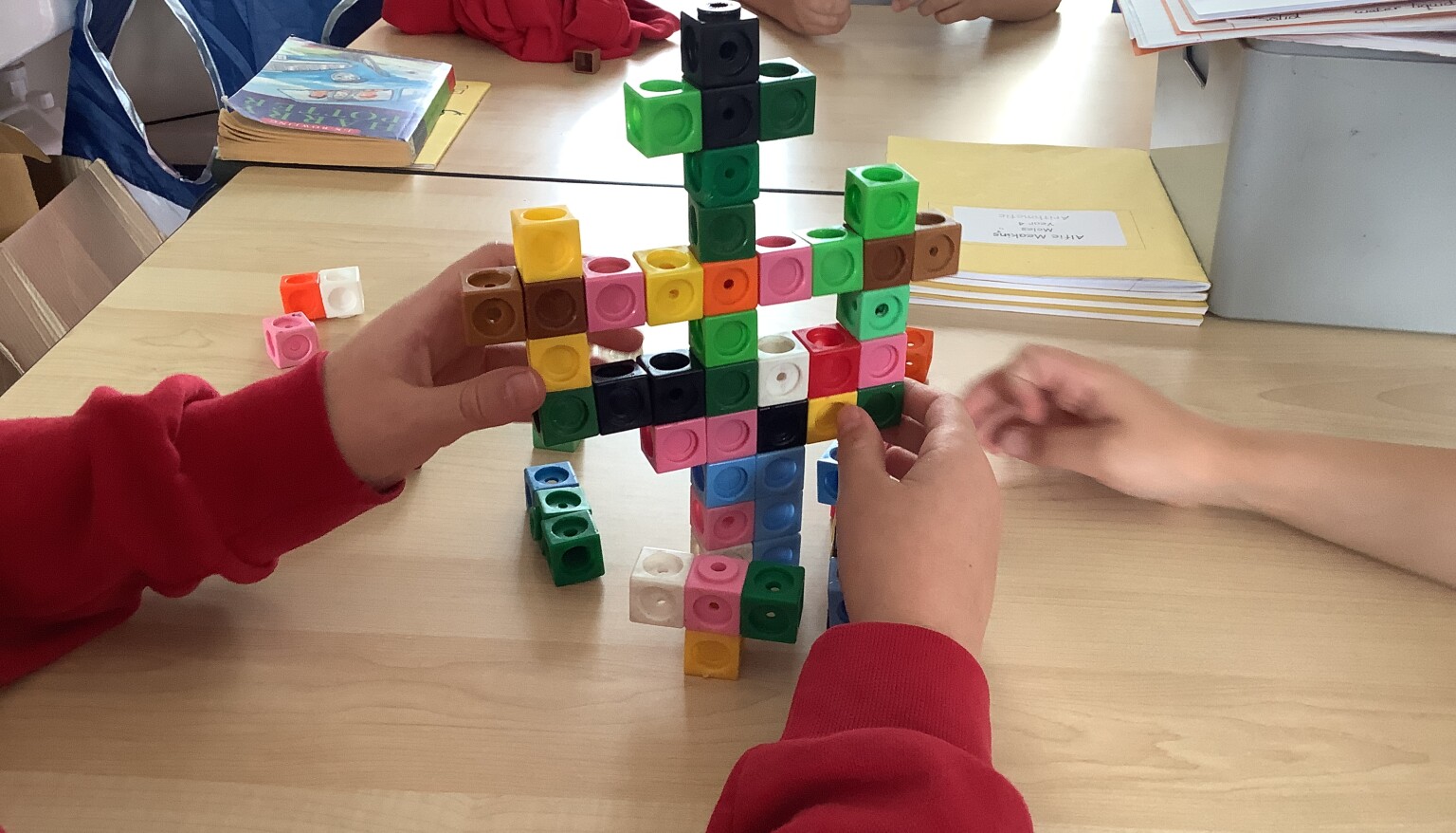 In art, we built sculptures out of cubes to understand the features and purpose of sculptures.