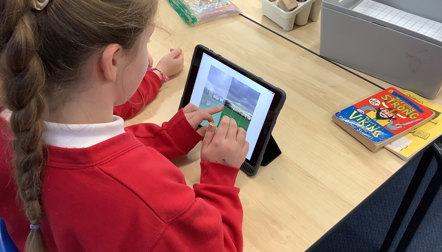 In art, we took photos of the landscape and used editing techniques to crop and change the filter on the photos.