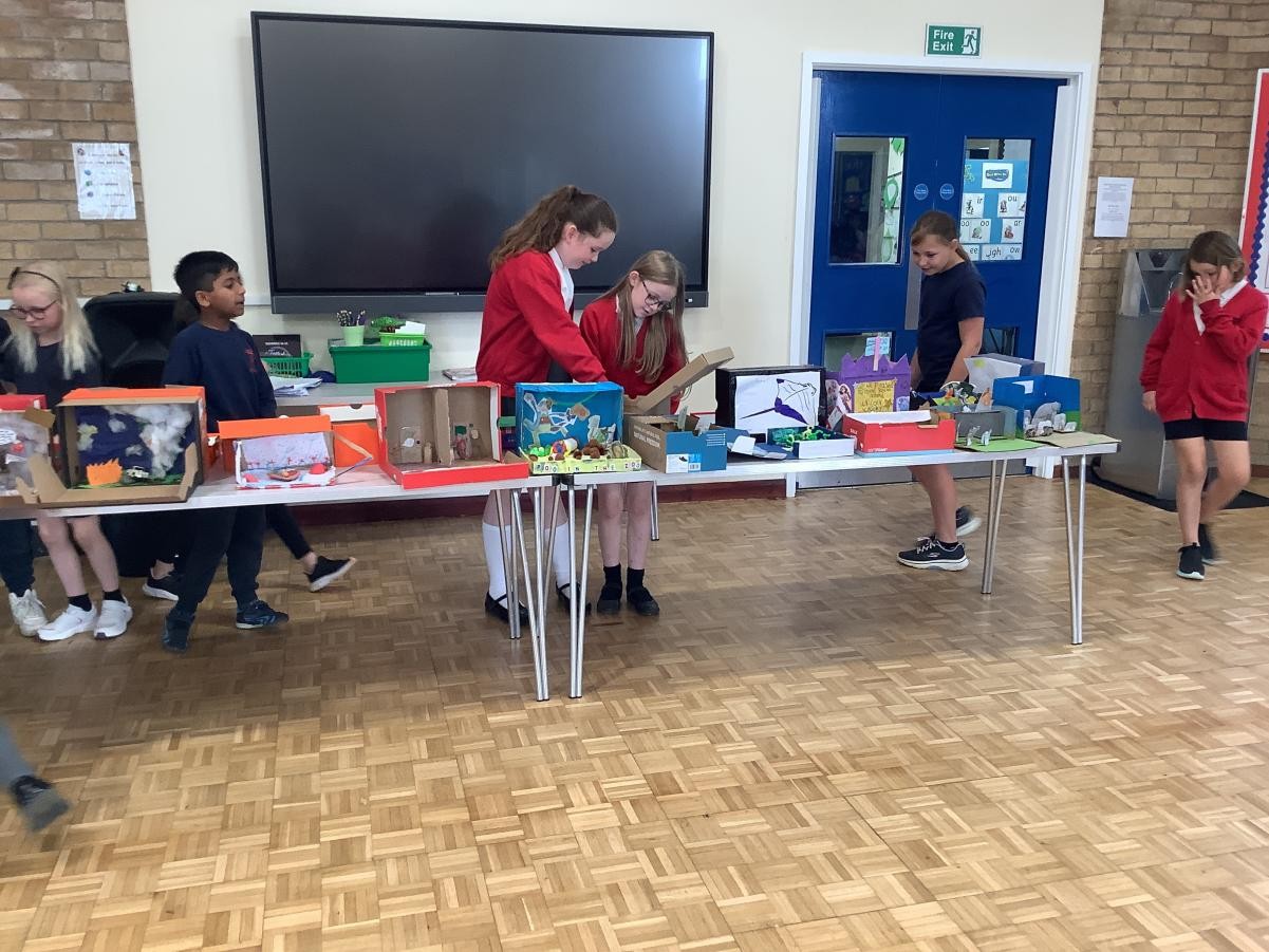 We spent the afternoon looking at all of the different 'Book in a Box' which were sent in for homework!