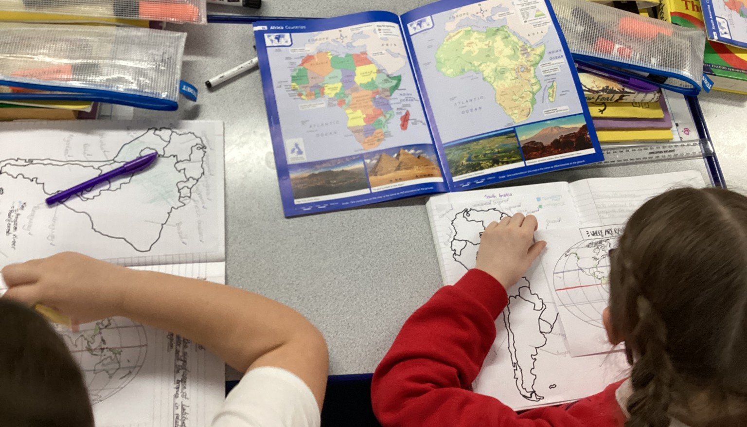 In geography, we used atlases to locate countries in South America.