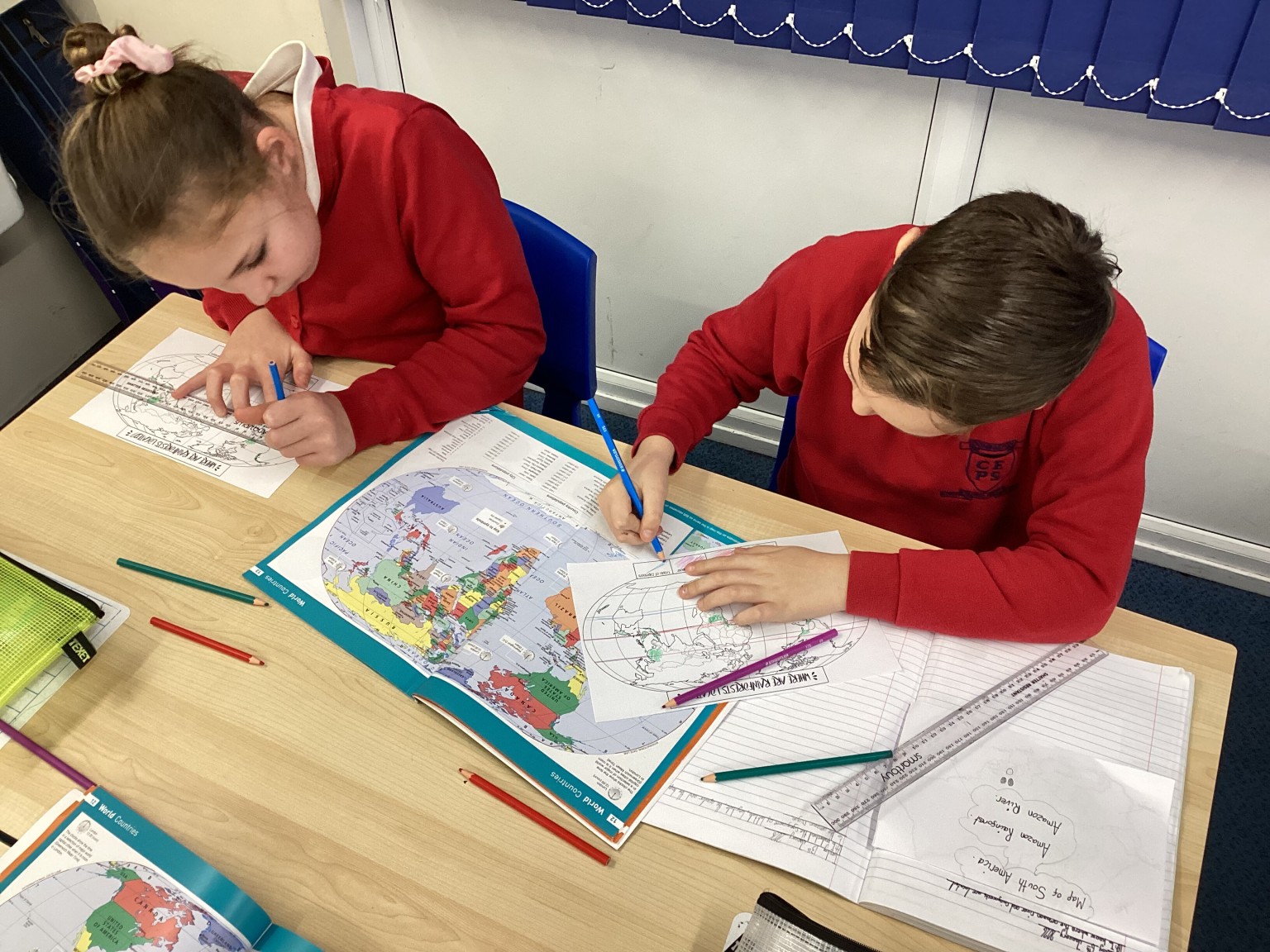Geography - We used atlases to find out where rainforests are located.