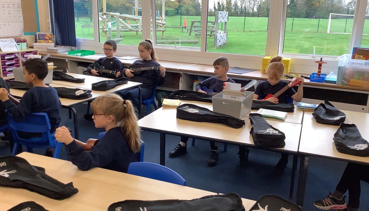 In music, we have started to learn the ukulele. We spent our first lesson practicing holding the ukulele, strumming and playing a C chord.