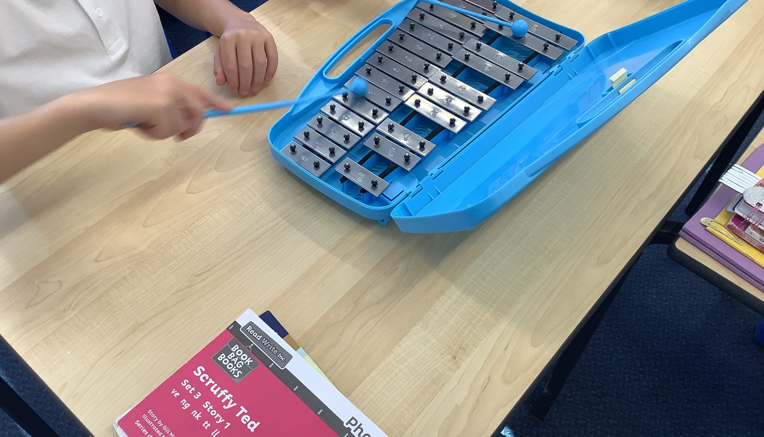 In music, we practiced playing different notes to play 'This Little Light of Mine'!